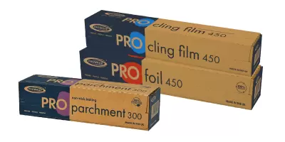 A selection of catering foil, film and parchment in brown cardboard dispensers