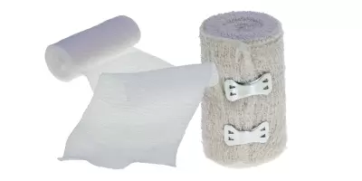 A roll of dressings and first aid tape