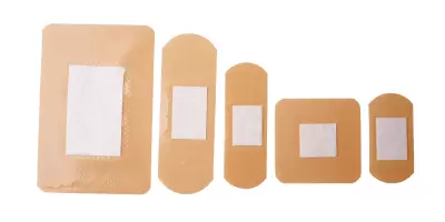 a pack of hypoallergenic plasters in a variety of sizes