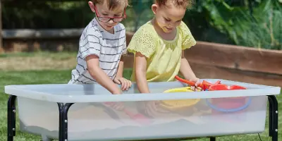The perfect base for messy play. Our strong, easy-clean trays and stands are built to handle everyday nursery adventures.